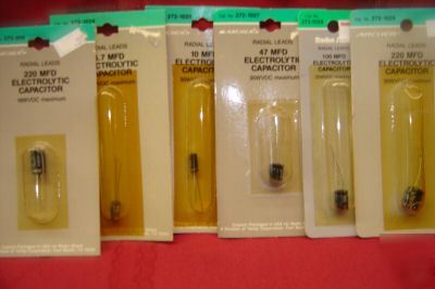 Assortment of 6-1@ mfd electrolytic capacitors -radial 